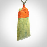 This is a lovely large toki pendant we've made from a gorgeous New Zealand Flower Jade. It is finished in a soft polish and is bound with our hand plaited, adjustable cord.